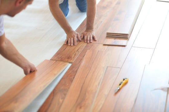 Installing laminate flooring in new home indoor