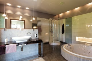 A big luxurious bathing room with elegant lighting.jpeg