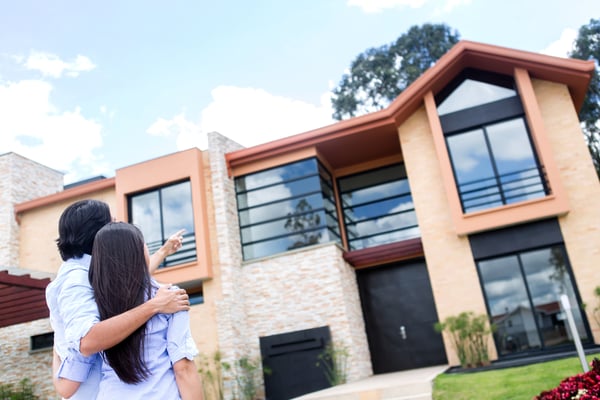 Couple looking at a beautiful house to buy-2