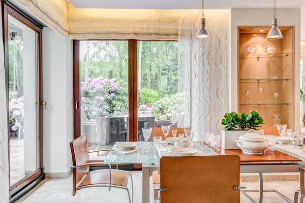 Modern style dining room with large windows