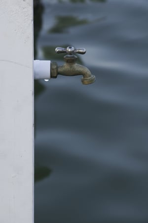 Water faucet at edge of dock