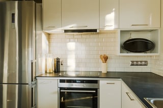 White brick wall in contemporary designed kitchen.jpeg